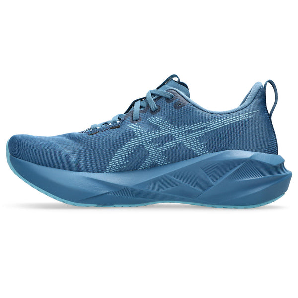 The medial side of this shoe features a lighter blue Asics logo to contrast the deeper blue upper.