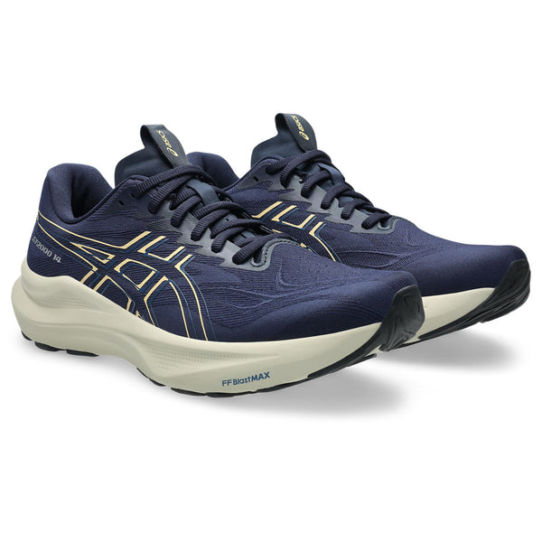 A pair of navy ASICS running shoes that also have navy laces.
