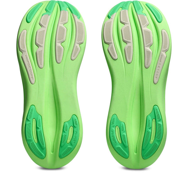 Green and gray shoe insoles on a white background