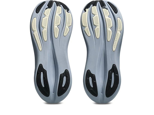 Pair of gray and black shoe insoles on a white background