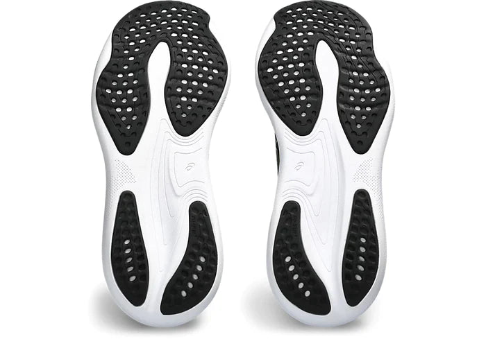 Bottom (outer sole) view of the Women's Nimbus 25 in Black/Glow Yellow