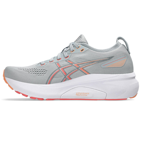 Gray running shoe with orange accents on a white background