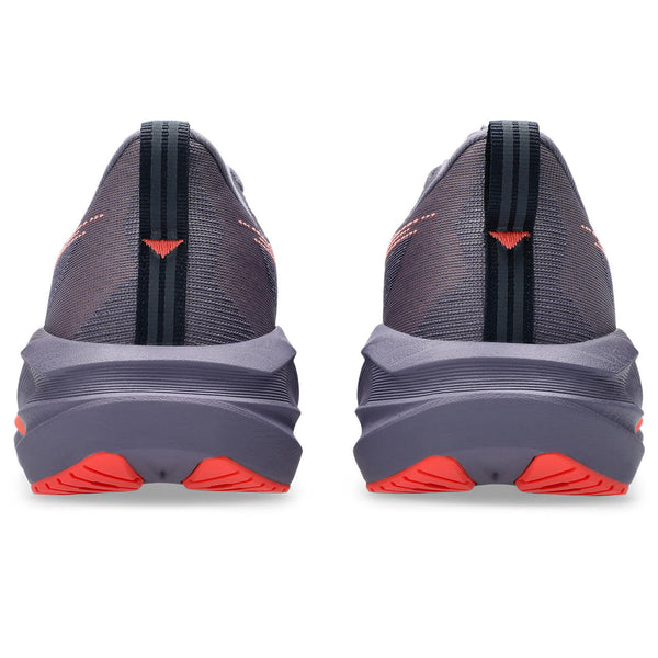 The heel area of these women's Novablast 5 shoes have a red triangle stitch holding the back tab on securely.