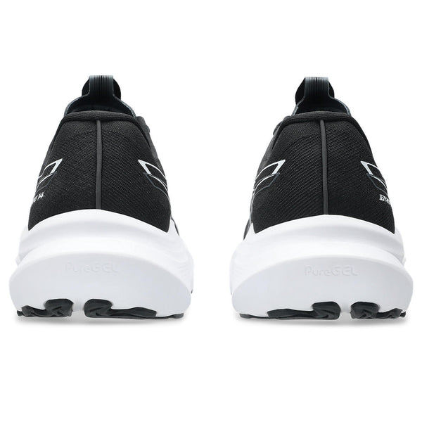Th back of the shoe shows the stark difference between the black upper and white midsole.