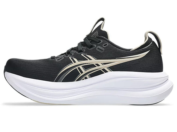 Black and white running shoe with a prominent brand logo on a white background