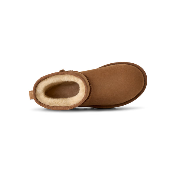 Tan lower calf length boot on a white background