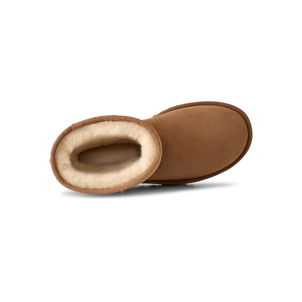 Calf height tan slipper boot on a white background