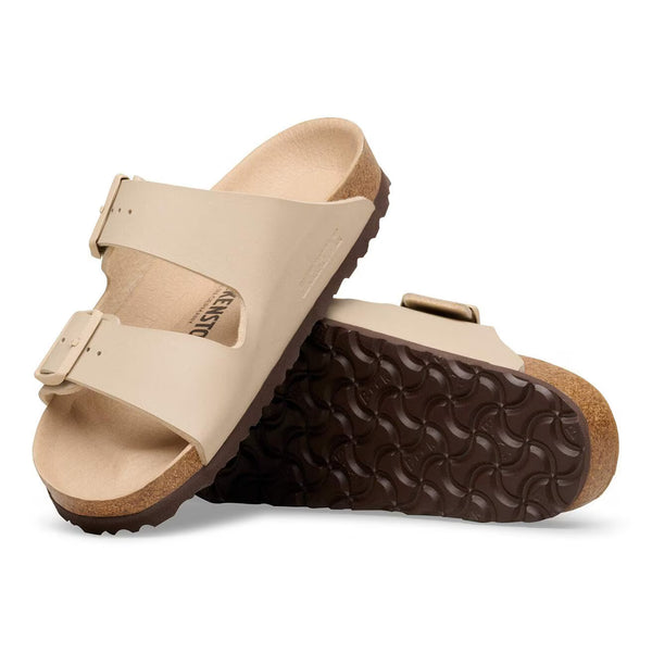 Tan 2 strap sandal on a white background