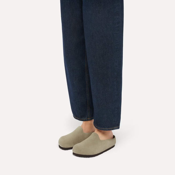 Taupe suede clog on a white background
