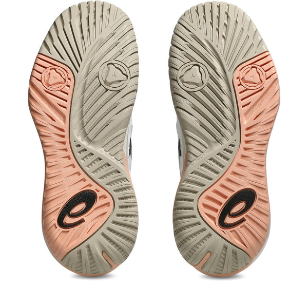 Close-up of a pair of shoes with a brand logo on a white background