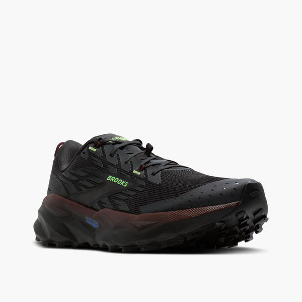 Black running shoe with visible 'Brooks' branding on a white background