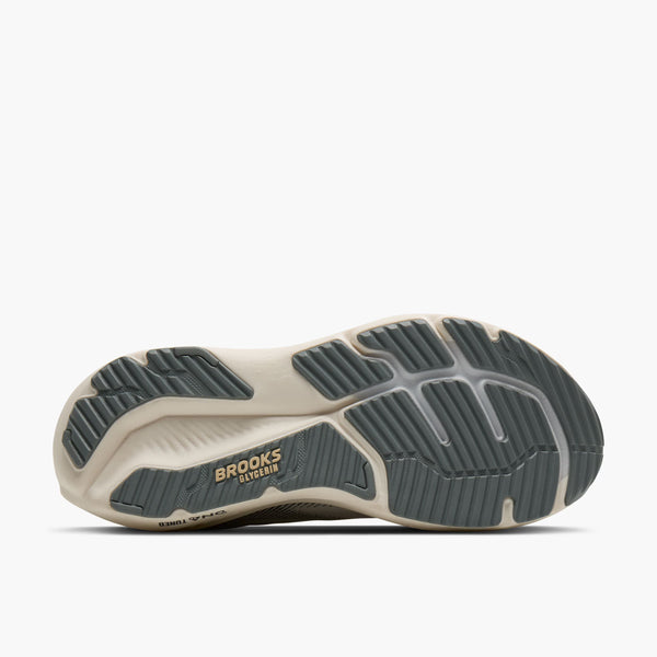 Sole of a running shoe with 'Brooks' branding on a white background