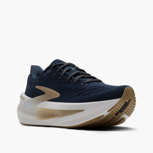 Navy running shoe with navy shoe laces white midsole on a light gray background