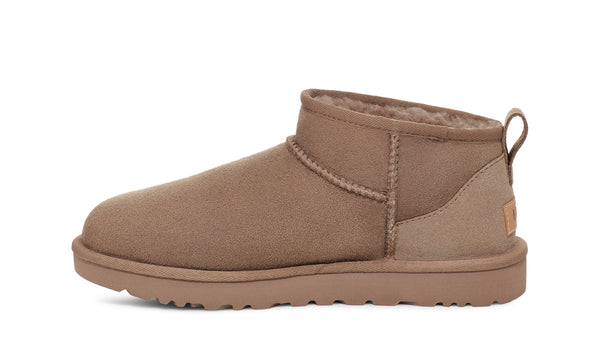Light brown ankle boot on a white background