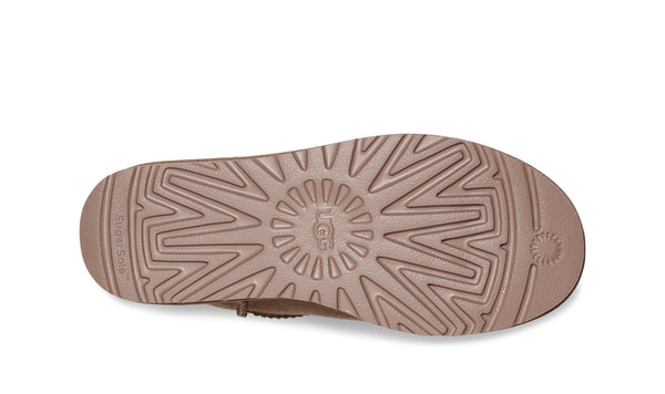 Light brown ankle boot on a white background