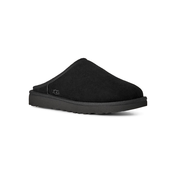 Black slip on slipper on a white background