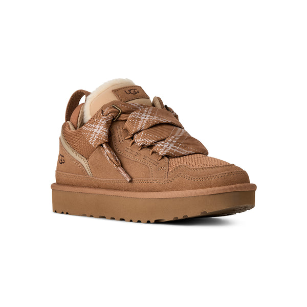 Tan sneaker with sherpa lining on a white background