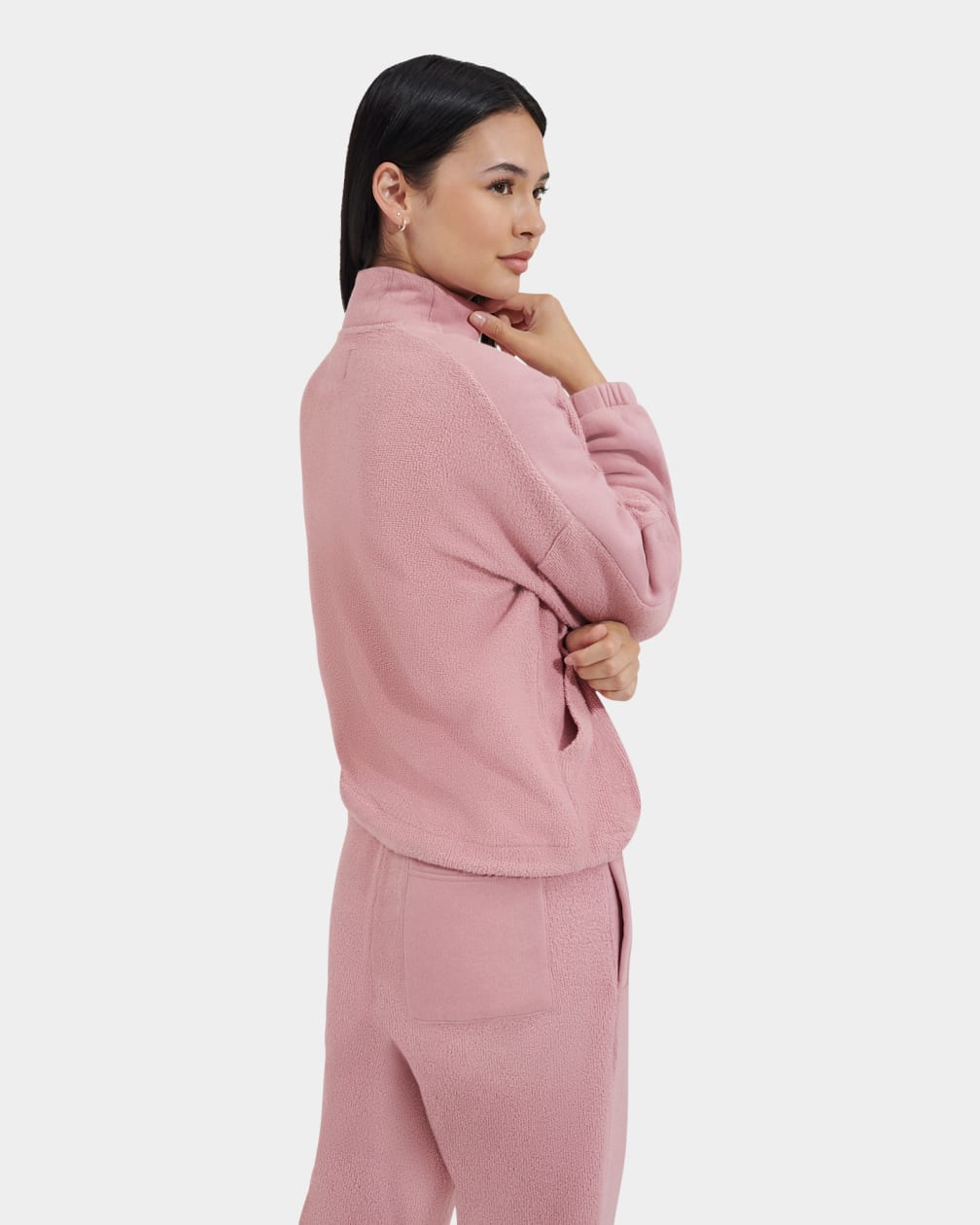 Back view of womens half zip fleece