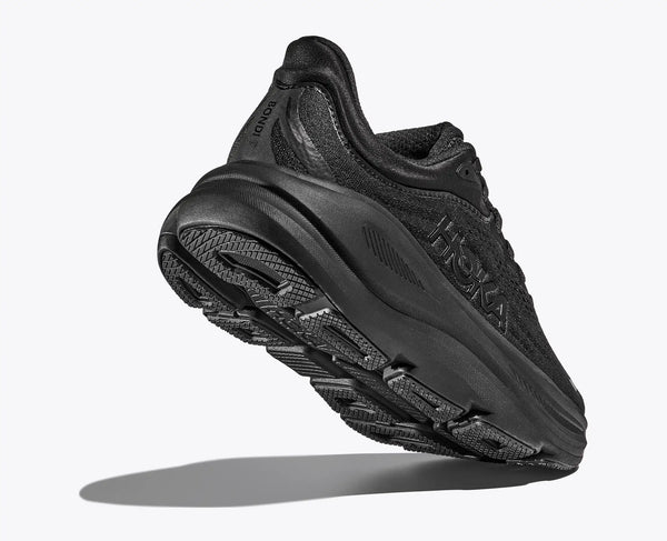 Black running shoe with 'Hoka' branding on a white background