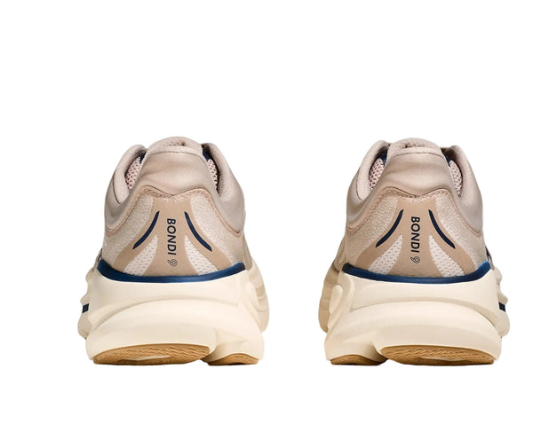 Pair of beige running shoes with 'Bondi' branding on a white background