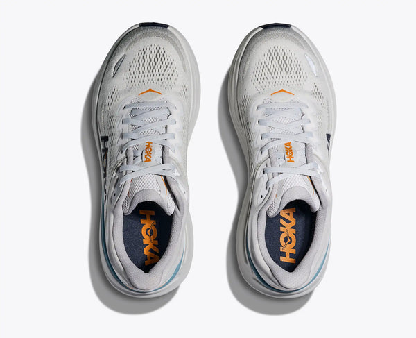 Pair of Hoka running shoes on a white background