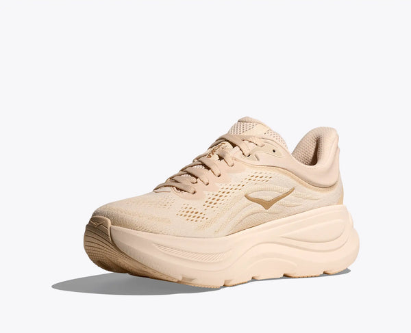 Beige running shoe on a white background