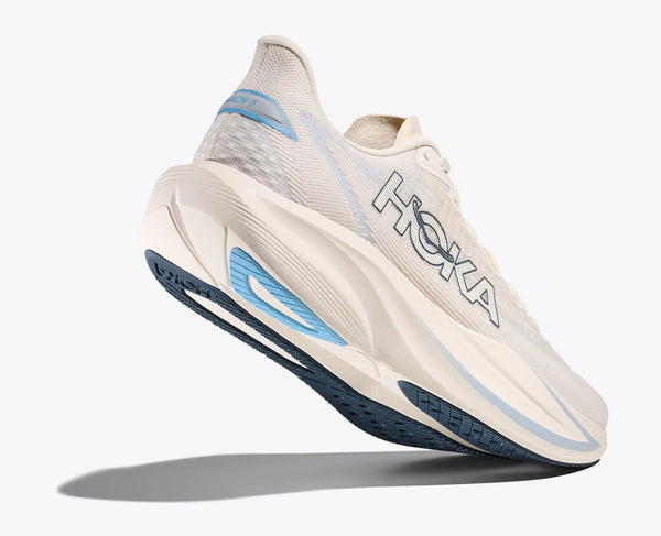 White running shoe with blue accents on a white background