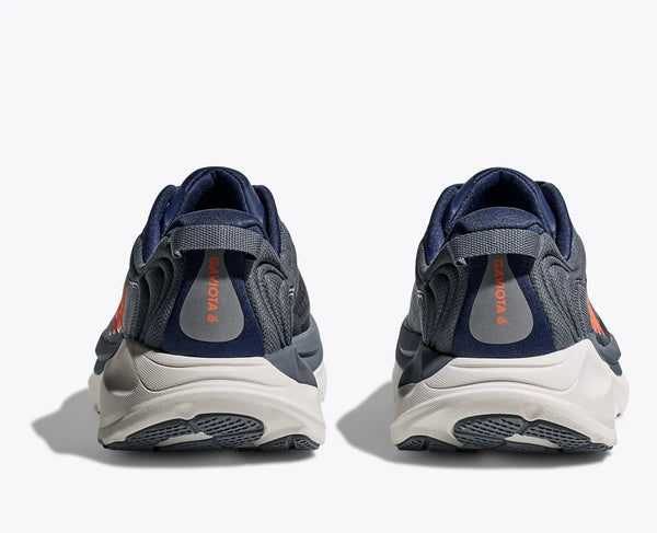 Pair of navy and gray sneakers on a white background
