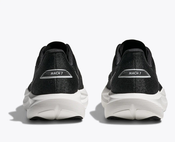 Black running shoes with 'MACH 7' label on a white background