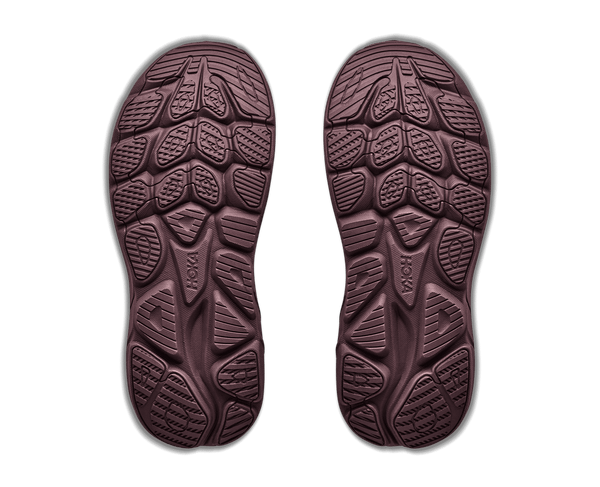A HOKA running shoe in a muted plum-purple color with bright pink laces and pull tabs