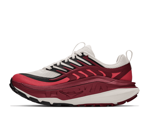 Burgundy and white trail running shoe on a white background