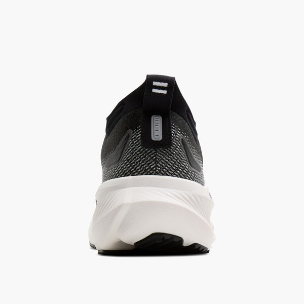 Black and white athletic shoe on a white background