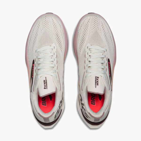 White running shoes with red sole on a white background