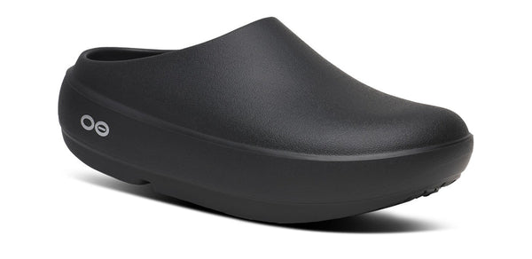 Black rubber clog on a white background