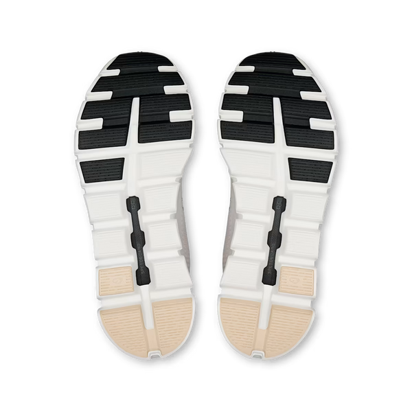 Light purple, cream and white training shoe on a white background