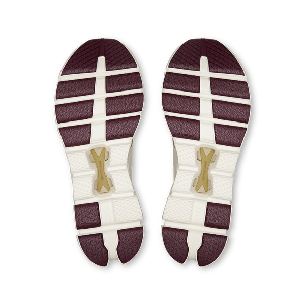 Pair of shoe insoles with a brand logo on a white background