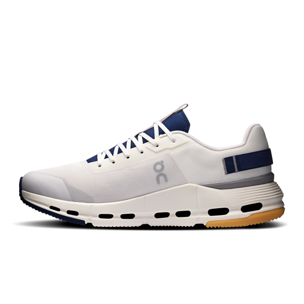White running shoe with blue accents on a white background