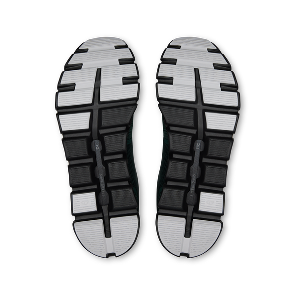 SOle view of a black and white shoe sole on a white background
