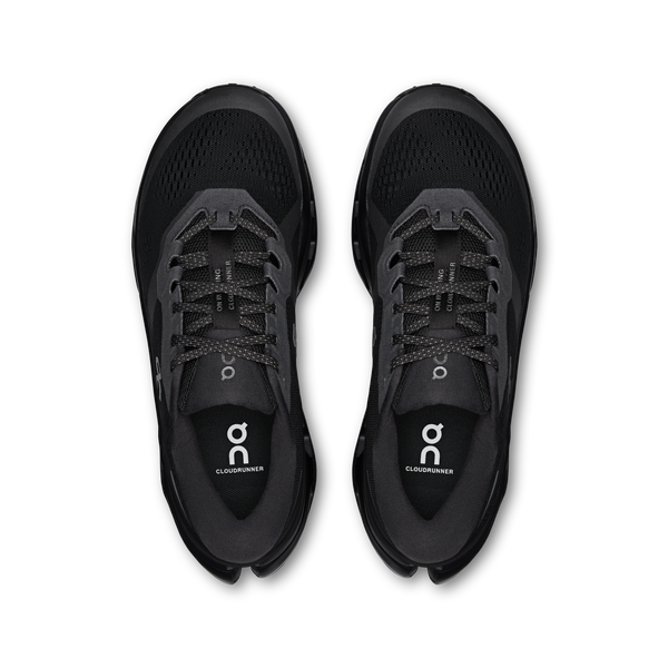 Black running shoes with 'on' branding on a white background