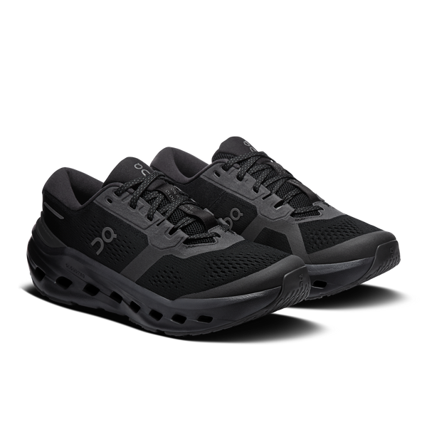 Black running shoes with 'On' branding on a white background