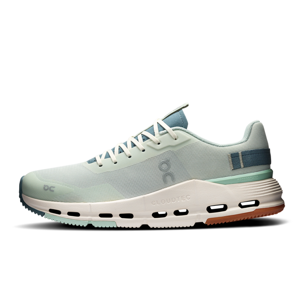 Light green running shoe with white sole on a white background