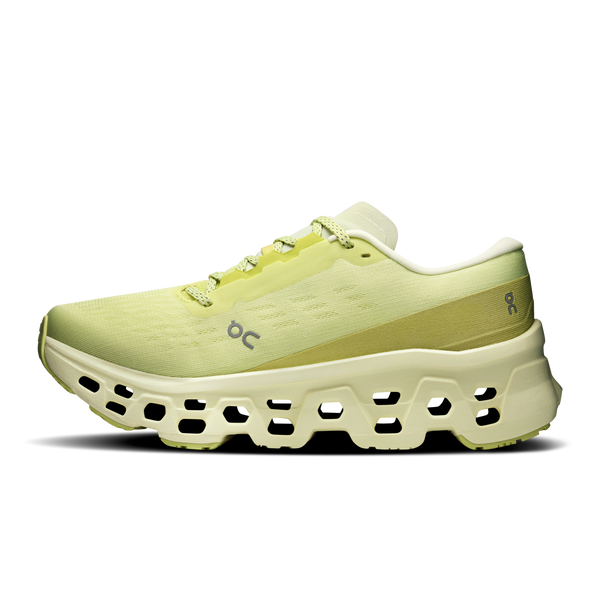 Light green running shoe with white sole on a white background