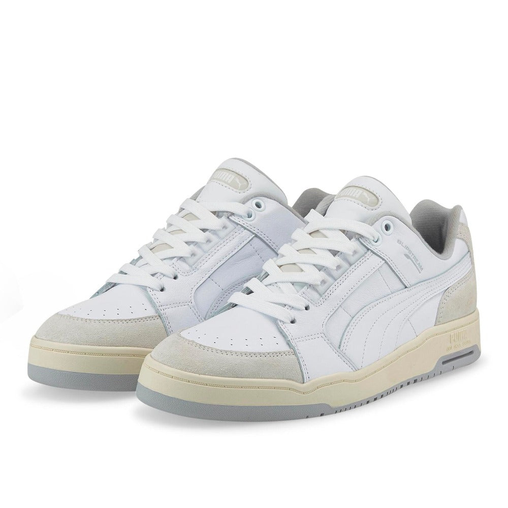 It's being reimagined and updated for the sneaker lovers of today, while staying true to its basketball heritage. These Slipstream Lo Retro Sneakers come with a plush leather upper, suede overlays and retro color pops for a classic look and attitude that