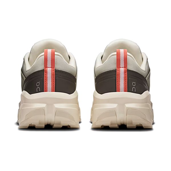 White sneakers with black and red accents on a transparent background