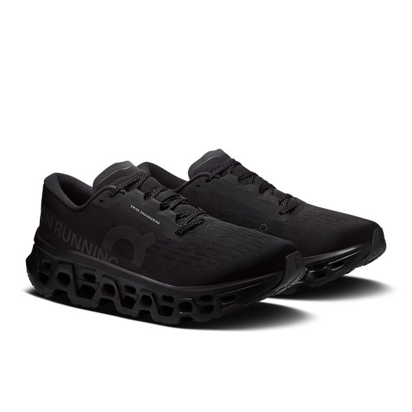 Black running shoes on a transparent background