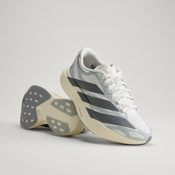 A pair of running shoes with 1 on its side with the outsle up and the other angled on top.