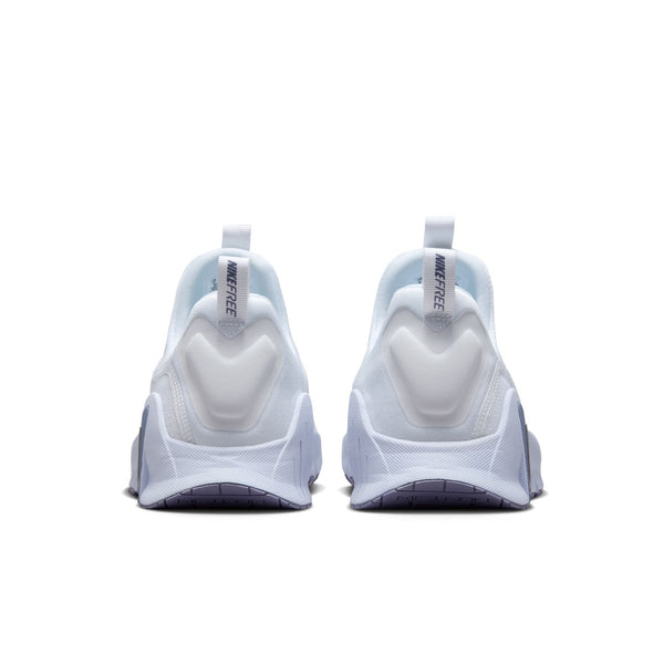 The heel area of this taining shoe has a tag that says Nike Free and a padded heel area.