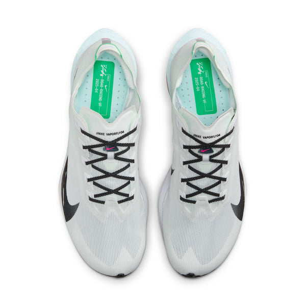 White athletic shoes with black swoosh logo on a white background.