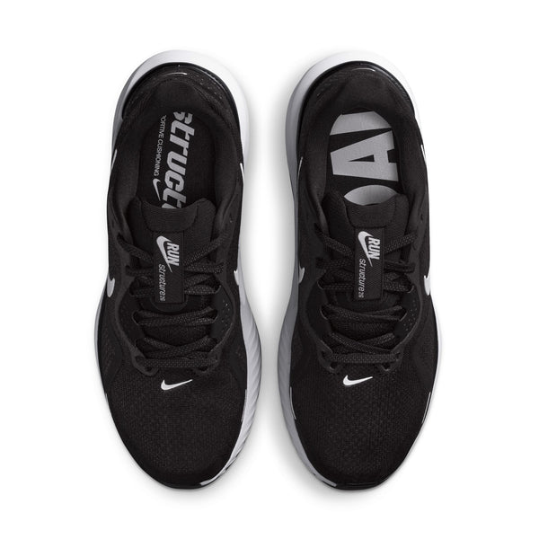 Black running shoes with white accents on a white background.