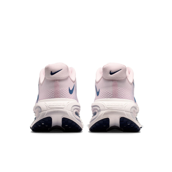 White and pink running shoes with blue accents on a white background